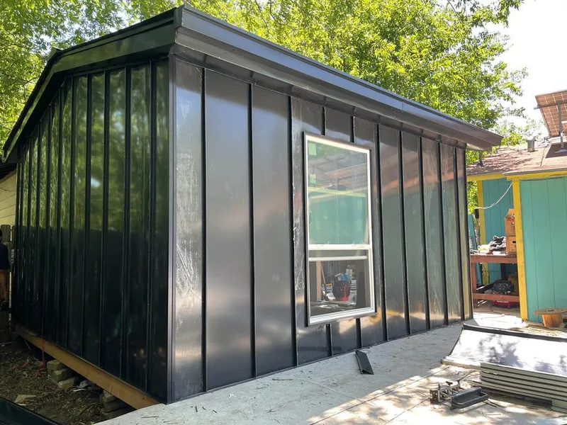 Black standing seam metal wall panels for Metal Roof Installation in Joliet