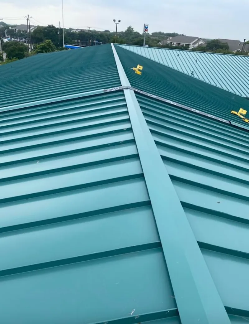 Green commercial metal roof ridge and valley for Metal Roof Repair in Joliet