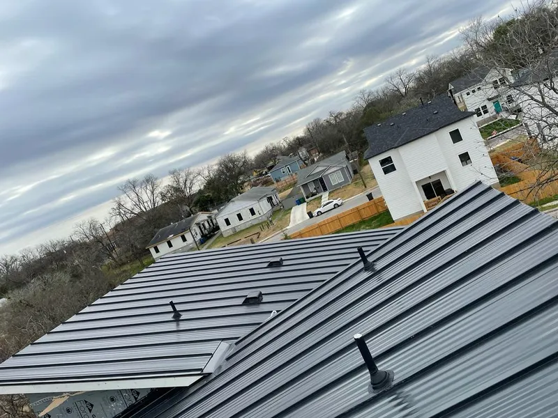 Standing seam metal roof panels with vents for Skylight Repair in Joliet